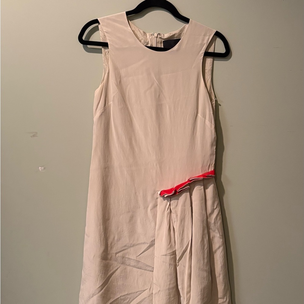 Sleeveless Cream Dress with Red Accent
